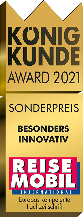 Goldene Plakette mit Krone oben mit der Aufschrift König Kunde Award 2021. Darunter steht Sonderpreis Besonders Innovativ. Unten steht das Logo der Zeitschrift Reisemobil International und Europas kompetente Fachzeitschrift.
