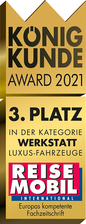 Goldene und bronzene Award-Plakette in Kronenform mit der Aufschrift König Kunde Award 2021, 3. Platz in der Kategorie Werkstatt Luxus-Fahrzeuge und dem Logo der Zeitschrift Reisemobil International am unteren Rand.